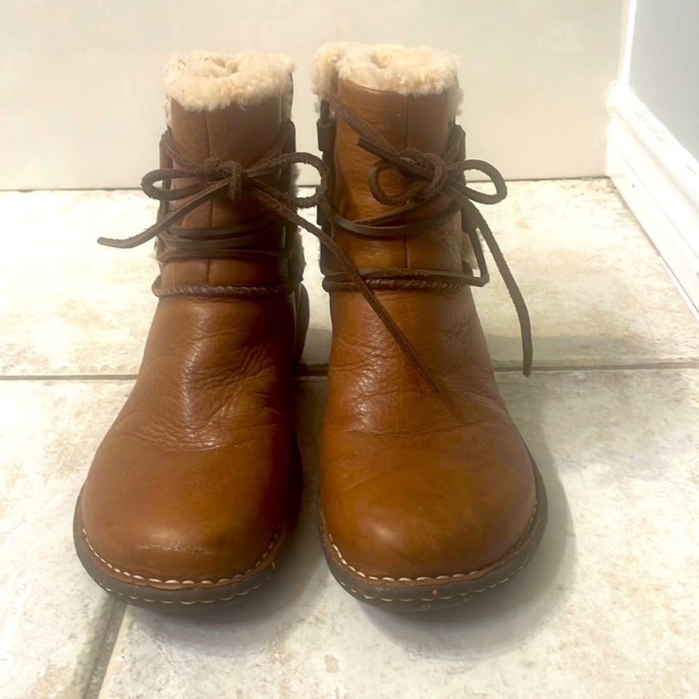 Brown Leather UGG boot.